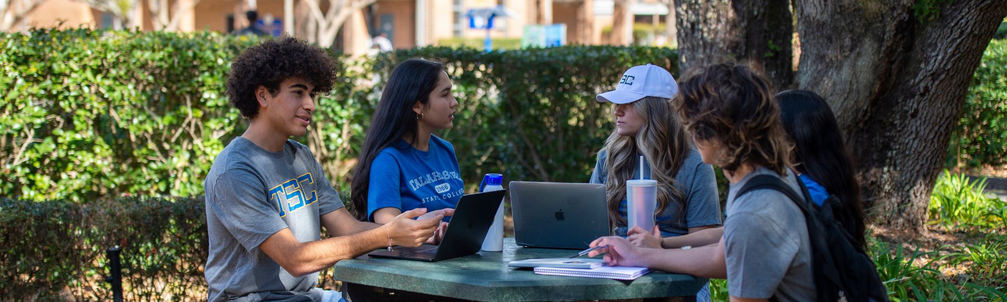 TSC Students sitting at a table