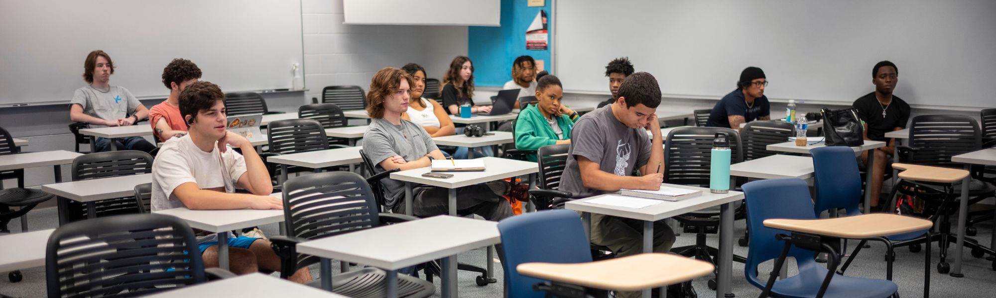 Students sitting at desks during class.