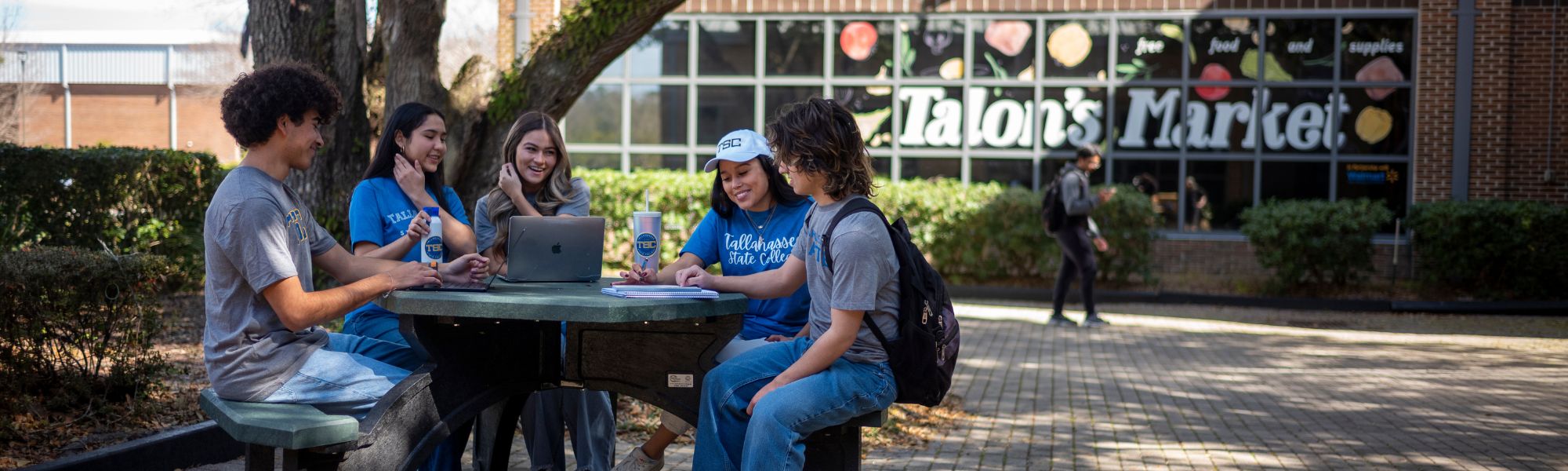 Busy campus walkway with students